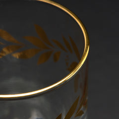 Color of abundance #7: Water glass decorated with golden flowery patterns
